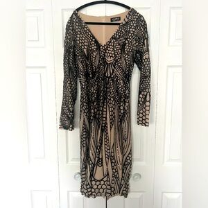 Illusion black sequin midi long sleeve dress.